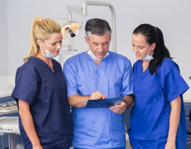 Dentist with staff 1