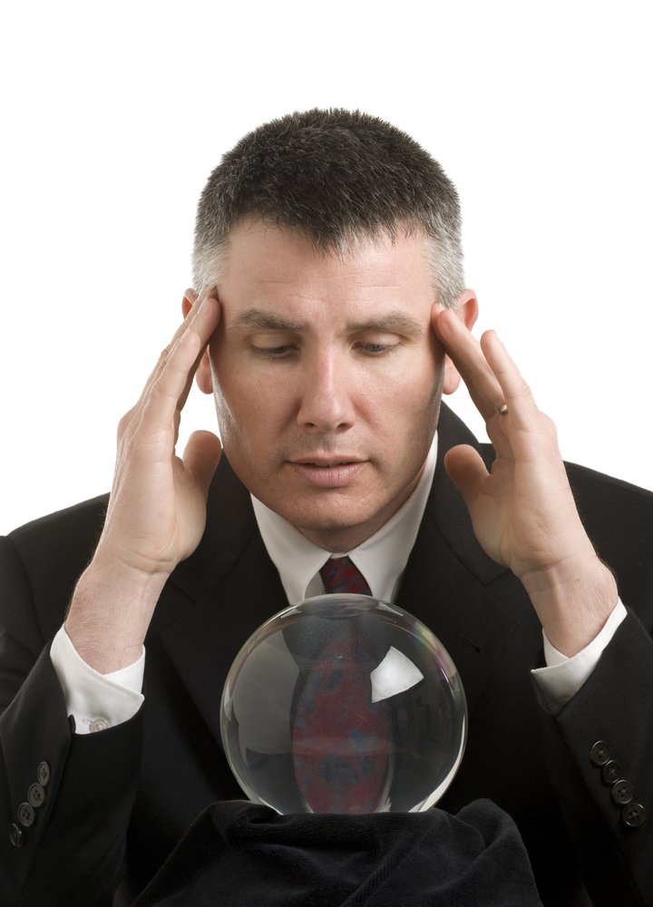 Man looking into crystal ball